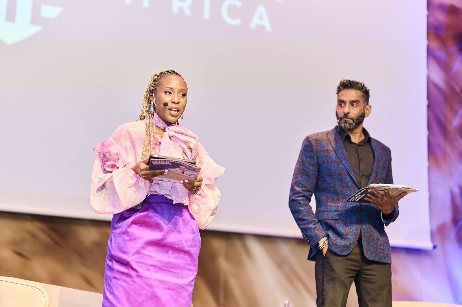 Natalie Manga moderating a panel at the RIKA Africa Leadership Summit